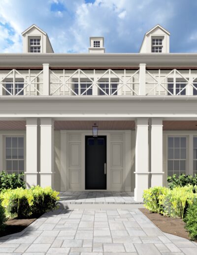 A large, two-story house with a white facade and veranda, featuring multiple windows, greenery in front, and a central dark front door. The sky is partly cloudy.