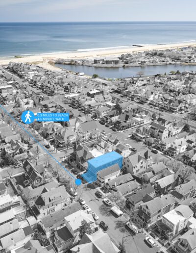 Aerial view of a coastal neighborhood with a marked walking route indicating a 0.3-mile and 5-minute walk to the beach.